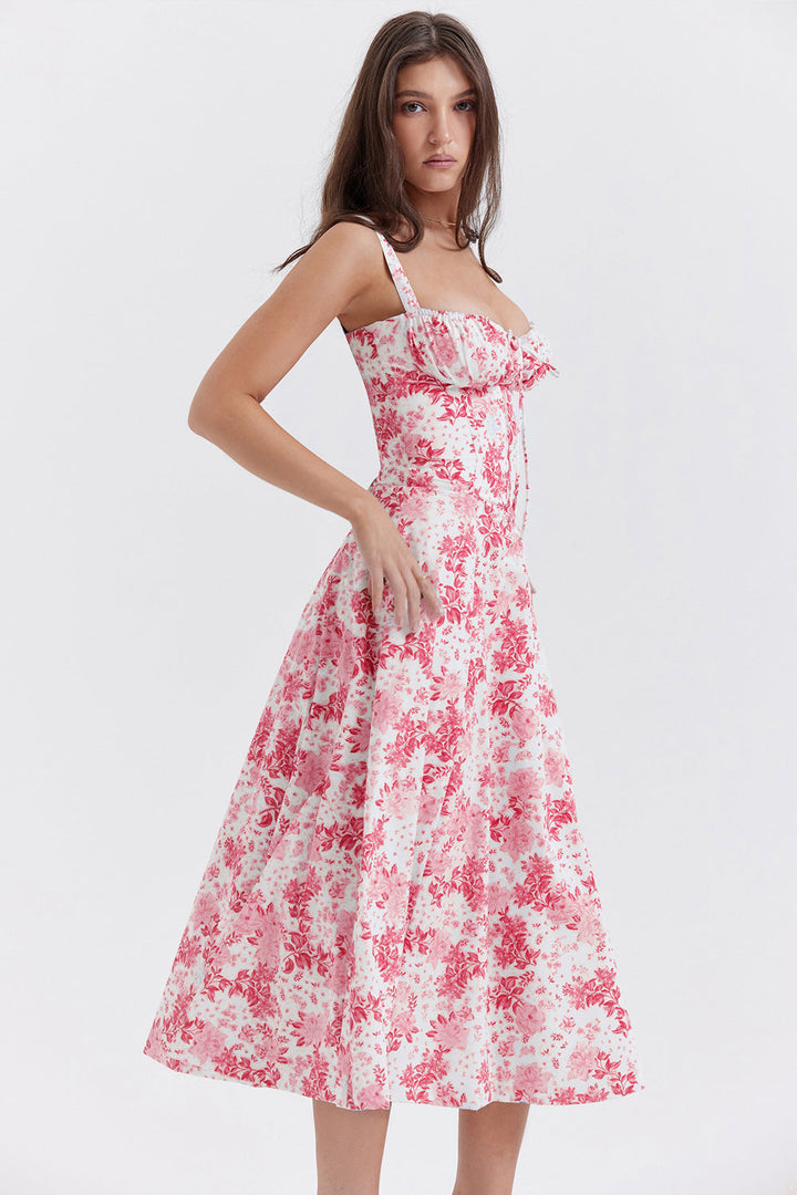 Abito estivo donna a fiori rosa, lunghezza midi, spalline sottili, scollo a cuore, stile elegante e casual, perfetto per occasioni estive.