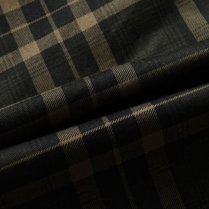 Tessuto scozzese nero e beige, motivo a quadri, ideale per abbigliamento moda, sartoria, alta qualità, stile classico ed elegante.