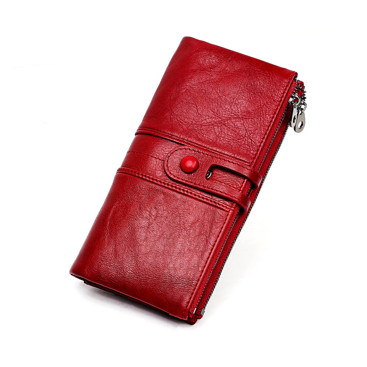 Portafoglio donna in pelle rossa, design elegante con chiusura a bottone e cerniera, accessorio moda, alta qualità, ideale per regali.