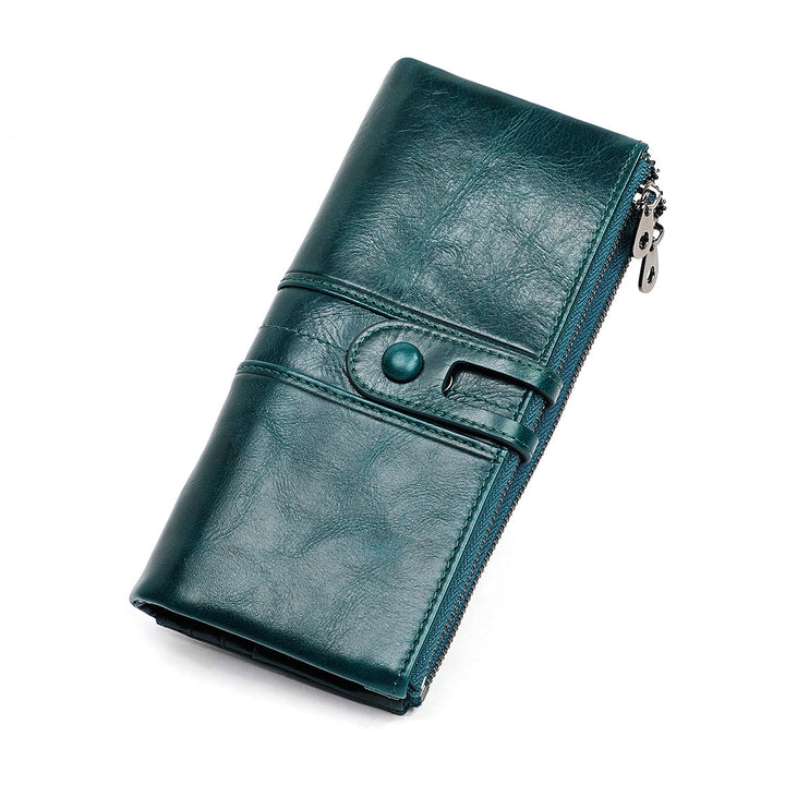 Portafoglio donna in pelle verde, design elegante con chiusura a bottone e cerniera, accessorio moda, ideale per organizzare carte e contanti.