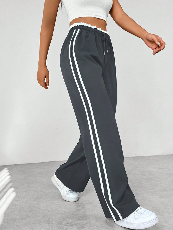 Pantaloni Donna Sportivi Tessuto Tecnico Gamba Larga