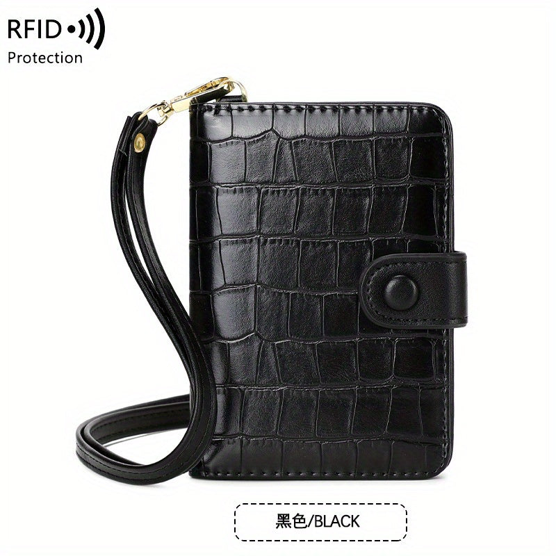 Portafoglio nero in pelle con texture coccodrillo, protezione RFID, cinturino da polso, chiusura a bottone. Elegante e sicuro per carte e contanti.