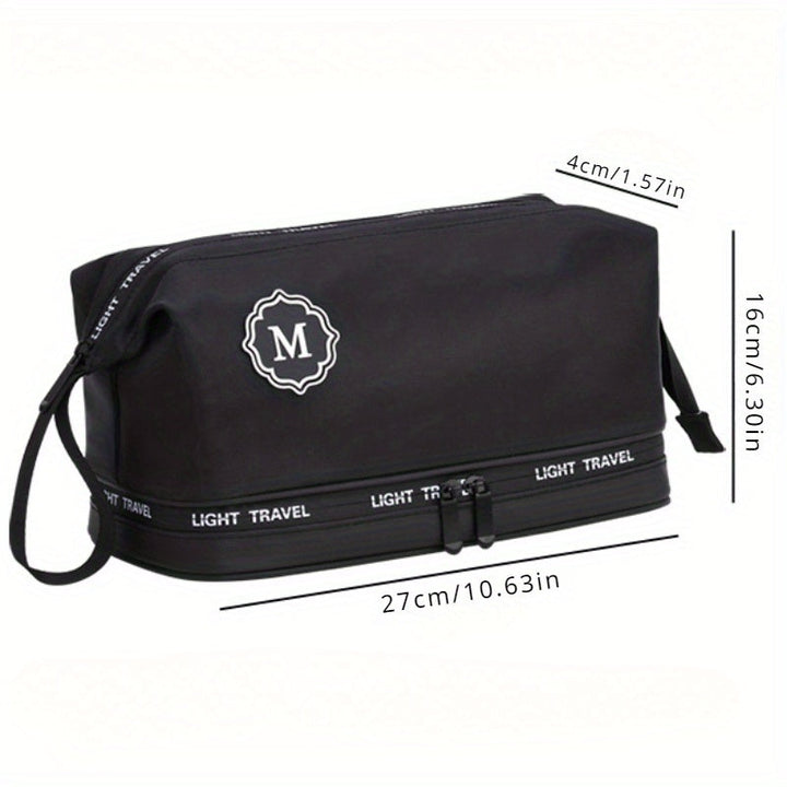 Borsa da viaggio nera con cerniera, logo "M", dimensioni 27x16x4 cm. Ideale per cosmetici, accessori, organizzazione bagagli.