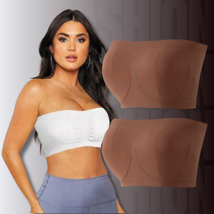 Donna con top bianco senza spalline, accanto a due reggiseni a fascia marroni. Moda intima femminile, comfort e stile.
