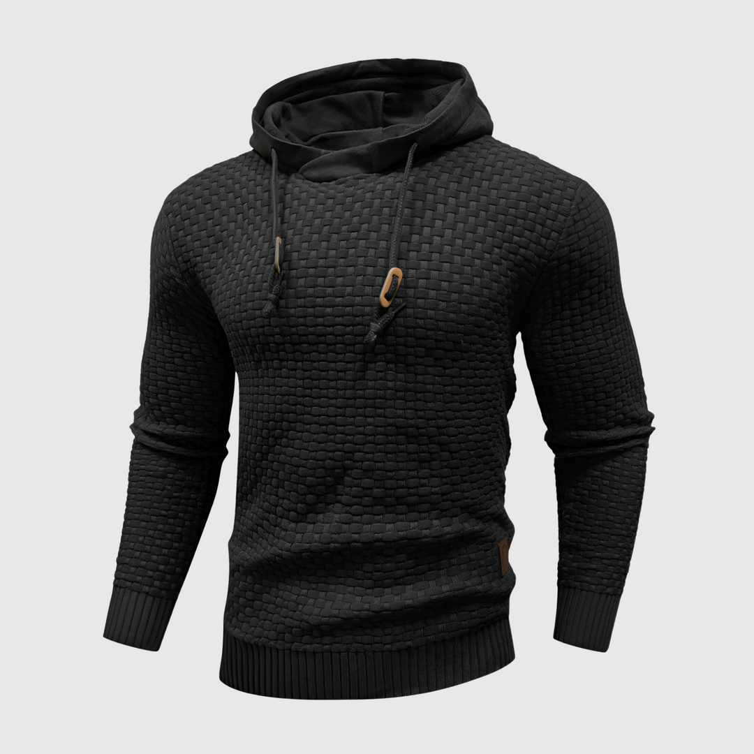 Felpa nera con cappuccio, design intrecciato, maniche lunghe, cordini regolabili, stile casual, tessuto morbido, ideale per moda autunno-inverno.
