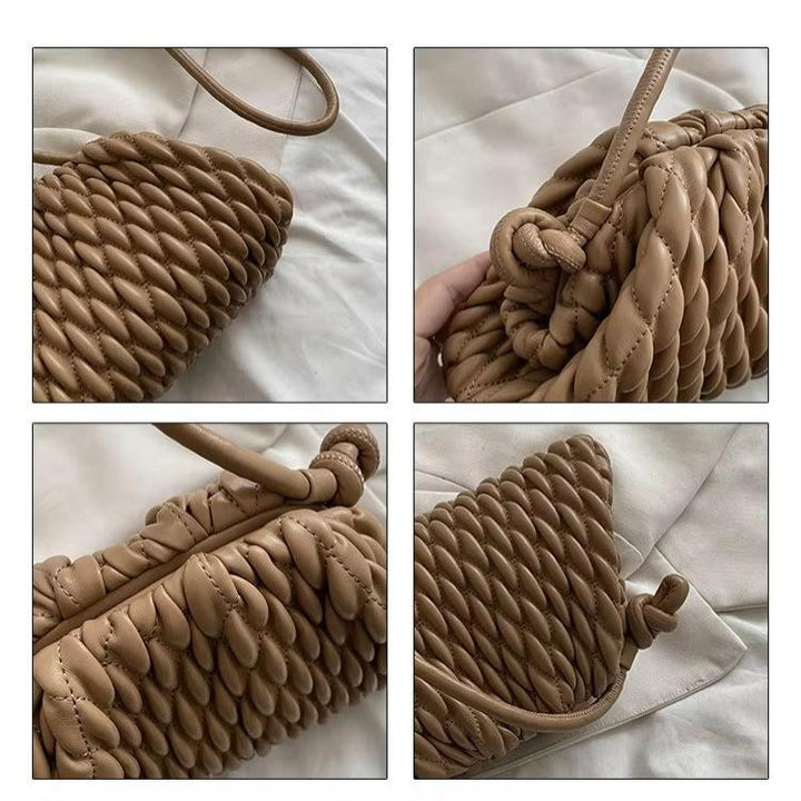 Borsa a tracolla intrecciata in pelle marrone, design moderno e texture unica, perfetta per moda donna. Accessorio elegante e versatile.