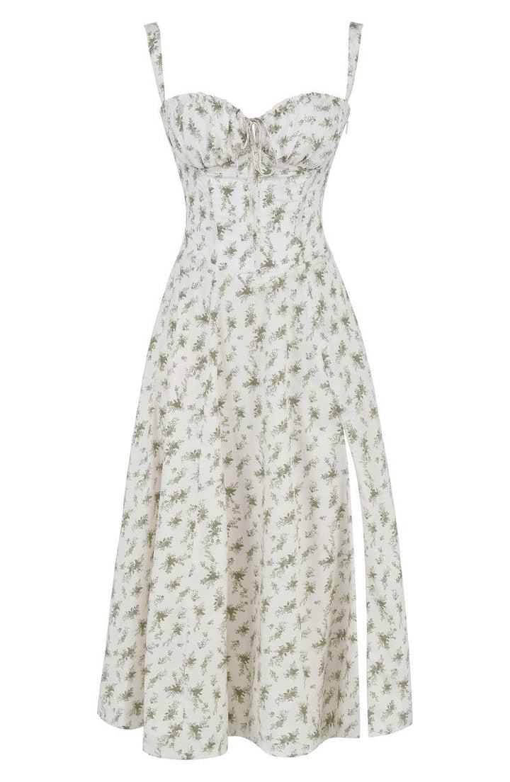 Abito estivo bianco a fiori verdi, senza maniche, con spacco laterale. Vestito midi elegante, perfetto per occasioni casual e formali.