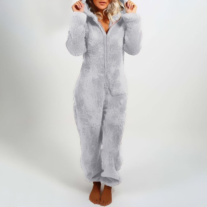 Tuta intera in pile grigio chiaro, donna, con cappuccio e zip frontale. Abbigliamento comodo, caldo, ideale per l'inverno e il relax a casa.