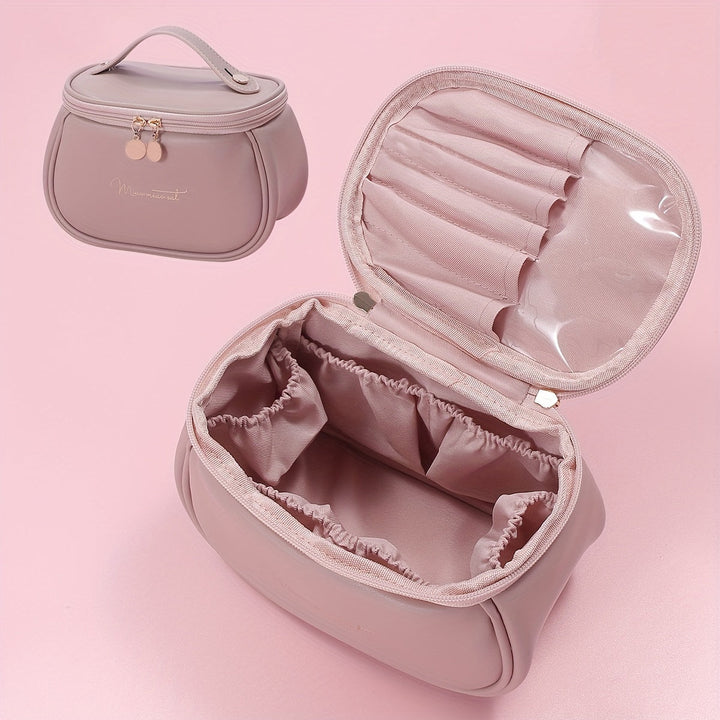 Borsa cosmetica rosa con scomparti multipli, design elegante, chiusura a zip, ideale per organizzare trucchi e accessori da viaggio.