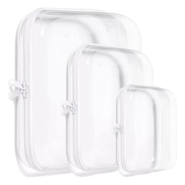 Set di tre borse trasparenti da viaggio, diverse dimensioni, con cerniera. Ideali per cosmetici, articoli da toeletta, conformi alle norme aeroportuali.