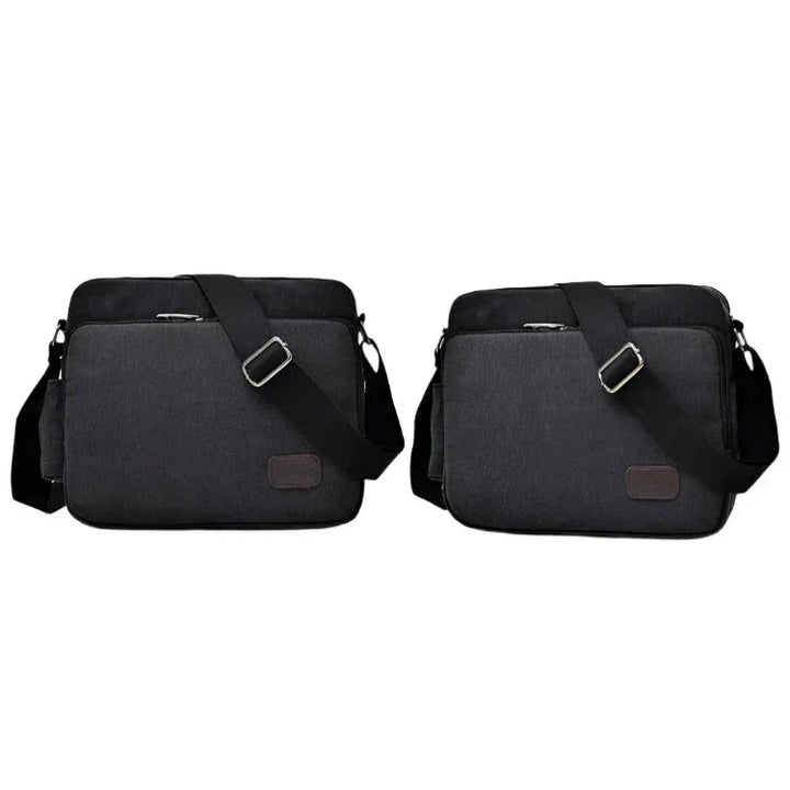 Due borse a tracolla nere in tessuto resistente, con cerniera e tasche multiple, ideali per laptop e accessori. Design moderno e funzionale.