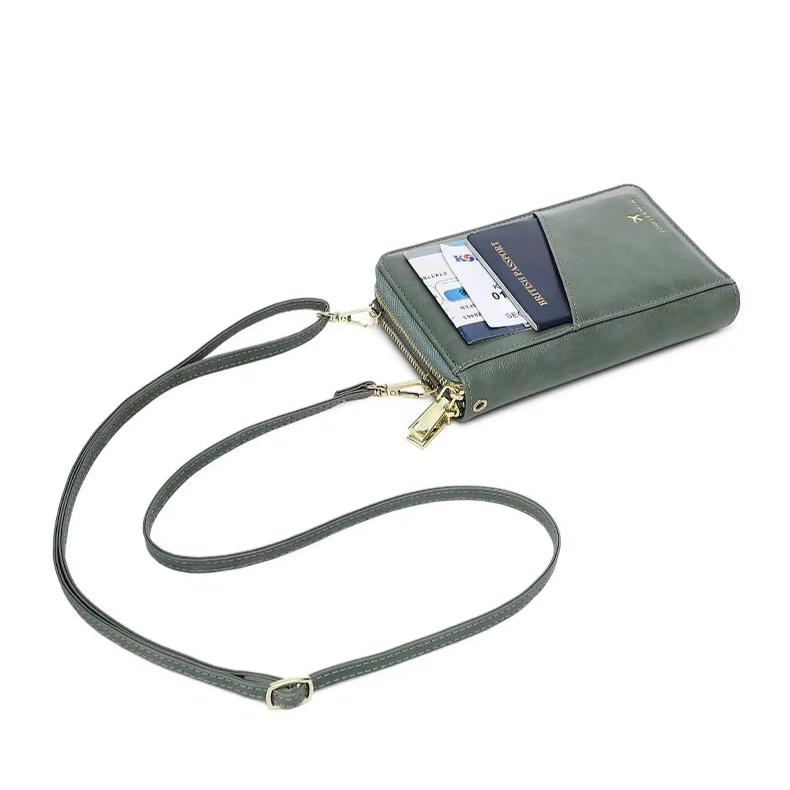 Borsa a tracolla verde in pelle con scomparti per carte di credito e passaporto, design elegante e compatto, ideale per viaggi e uso quotidiano.