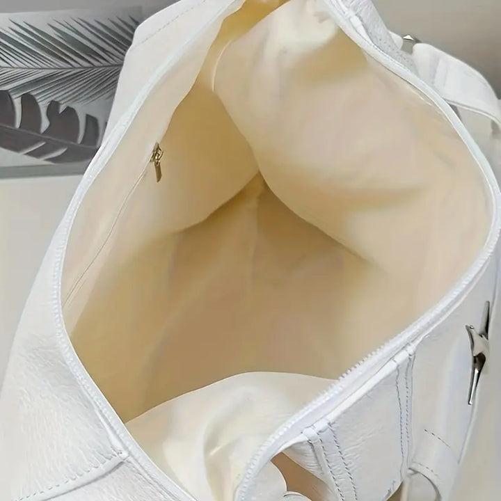 Borsa a tracolla bianca in pelle, interno spazioso con tasca con zip, design elegante e moderno, accessorio moda donna.