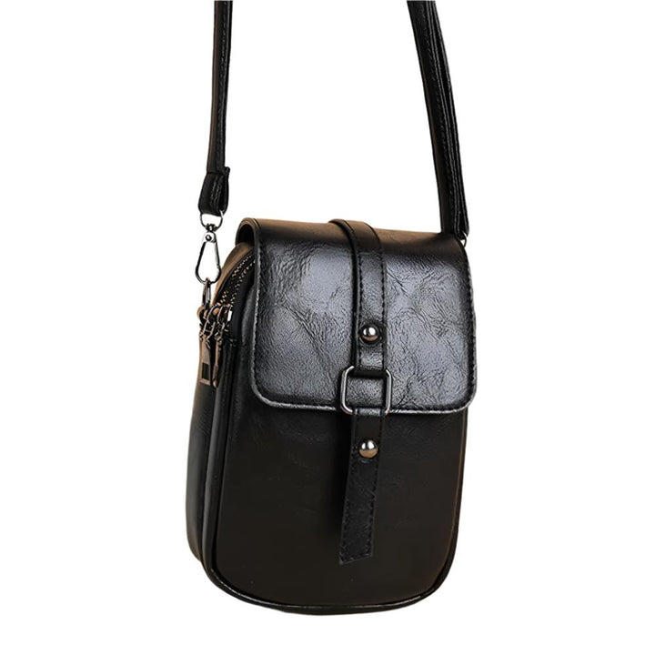 Borsa a tracolla in pelle nera, design elegante e compatto, chiusura con fibbia, ideale per uomo, accessorio moda versatile e pratico.