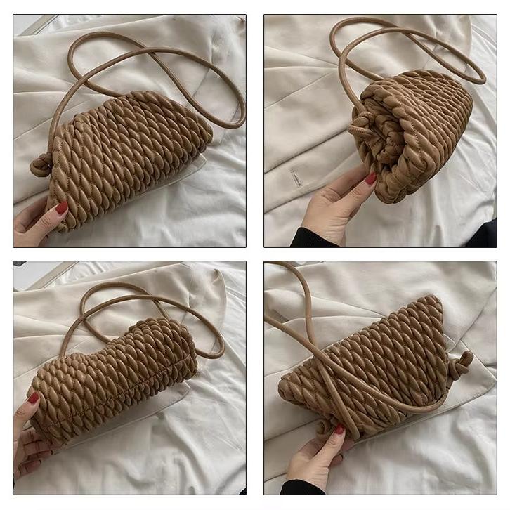 Borsa a tracolla intrecciata in pelle marrone, design moderno, vista da diverse angolazioni. Accessorio moda elegante e versatile.