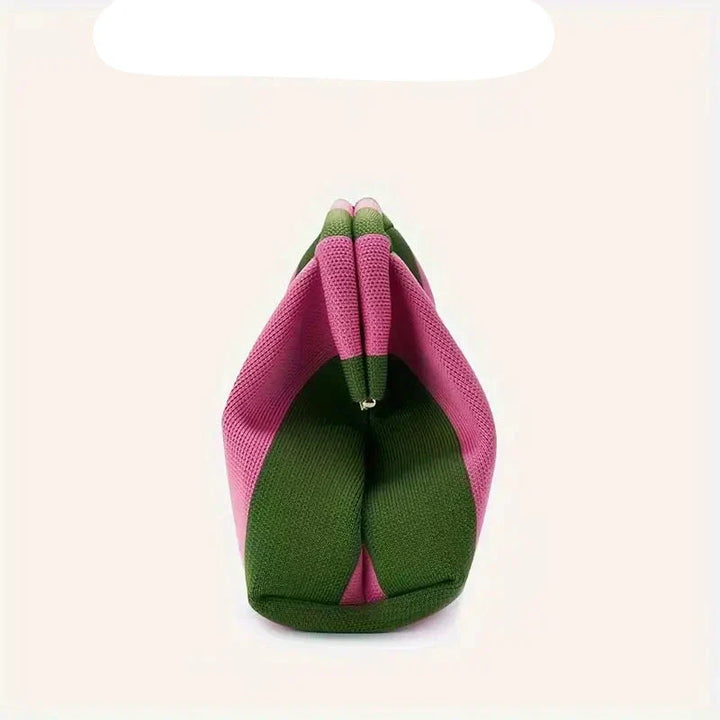 Borsa a mano in tessuto rosa e verde, design moderno e pieghevole, accessorio moda elegante per donna, perfetta per ogni occasione.