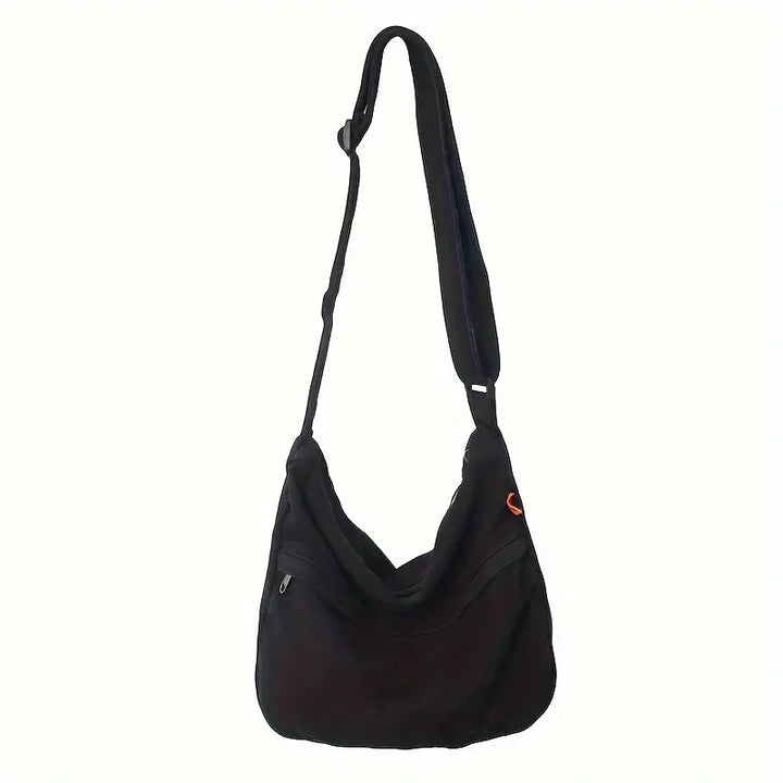 Borsa a tracolla nera unisex, design moderno, con tasche multiple e cerniera, ideale per uso quotidiano e viaggi. Accessorio moda versatile.