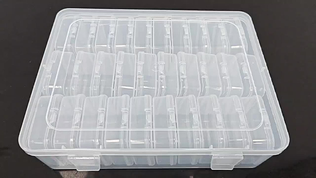 Scatola organizer trasparente in plastica con scomparti regolabili, ideale per conservare piccoli oggetti, accessori artigianali o minuteria.
