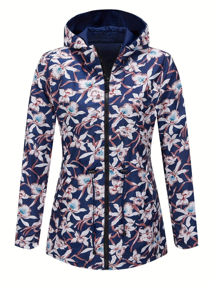 Giacca impermeabile donna con cappuccio, motivo floreale blu e bianco, chiusura zip, ideale per primavera e autunno. Moda casual elegante.