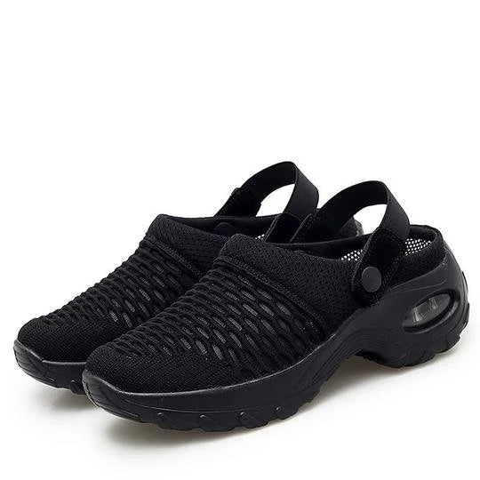 Scarpe da uomo nere in rete traspirante, design casual con suola antiscivolo e cinturino regolabile. Ideali per attività all'aperto e tempo libero.