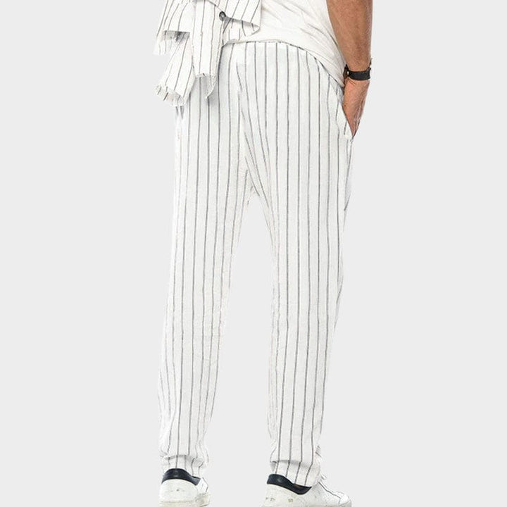 Pantaloni uomo a righe verticali bianche e nere, stile casual, tessuto leggero, adatti per l'estate, moda maschile, abbigliamento comodo.