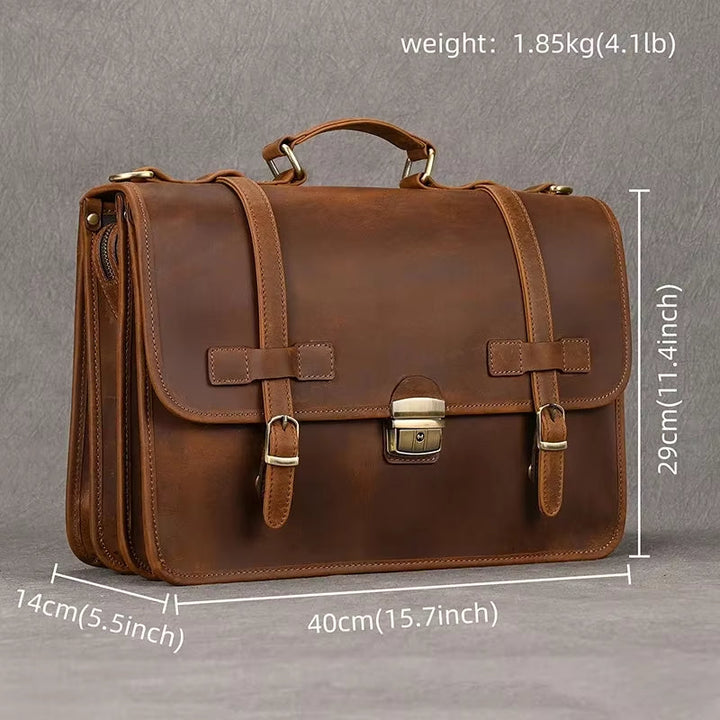 Borsa a tracolla in pelle marrone, dimensioni 40x29x14 cm, peso 1,85 kg. Design elegante con fibbie e manico, ideale per lavoro e viaggi.