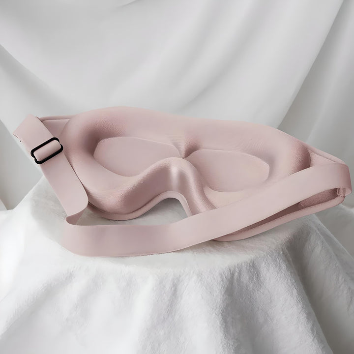 Maschera per dormire in seta rosa, design ergonomico, cinturino regolabile, ideale per bloccare la luce, migliorare il sonno e il relax.