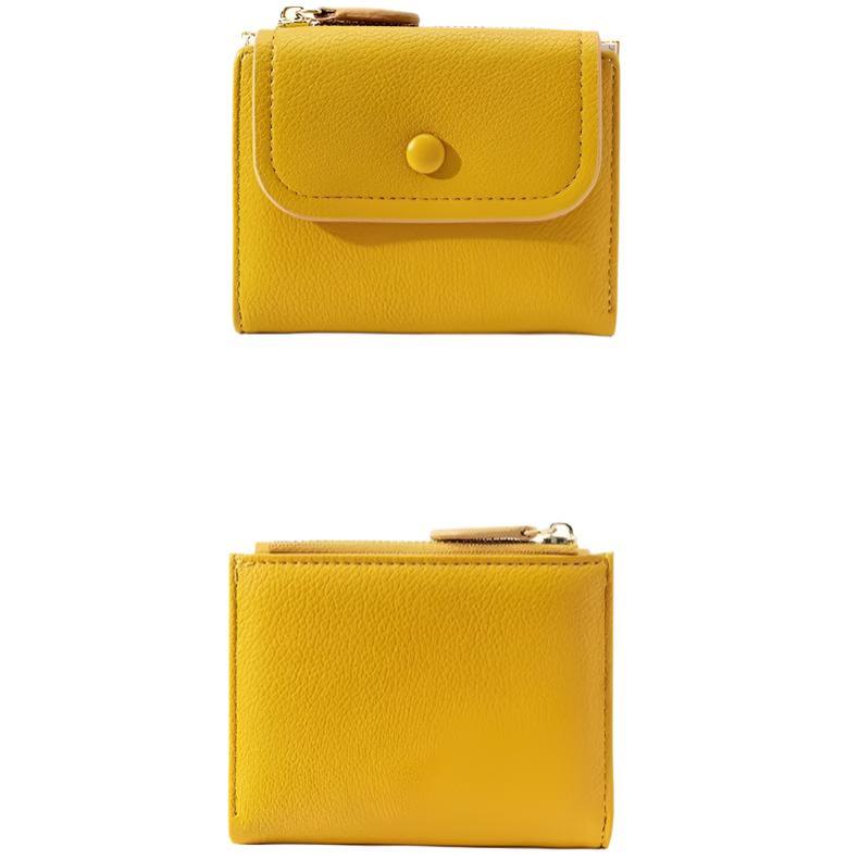 Portafoglio donna in pelle gialla, design compatto con chiusura a bottone e zip, ideale per carte e monete. Accessorio moda elegante e pratico.