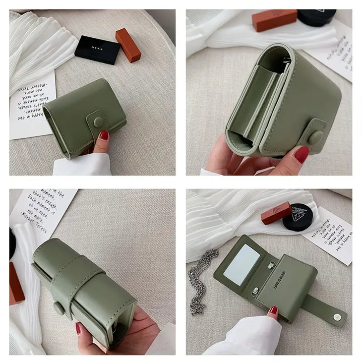 Portafoglio donna verde salvia in pelle sintetica, compatto e pieghevole, con scomparti per carte e monete. Accessorio moda elegante e pratico.