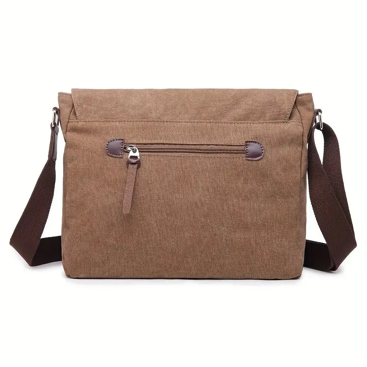 Borsa a tracolla in tela marrone con cerniera frontale, design elegante e pratico, ideale per uomo e donna. Accessorio moda versatile e resistente.