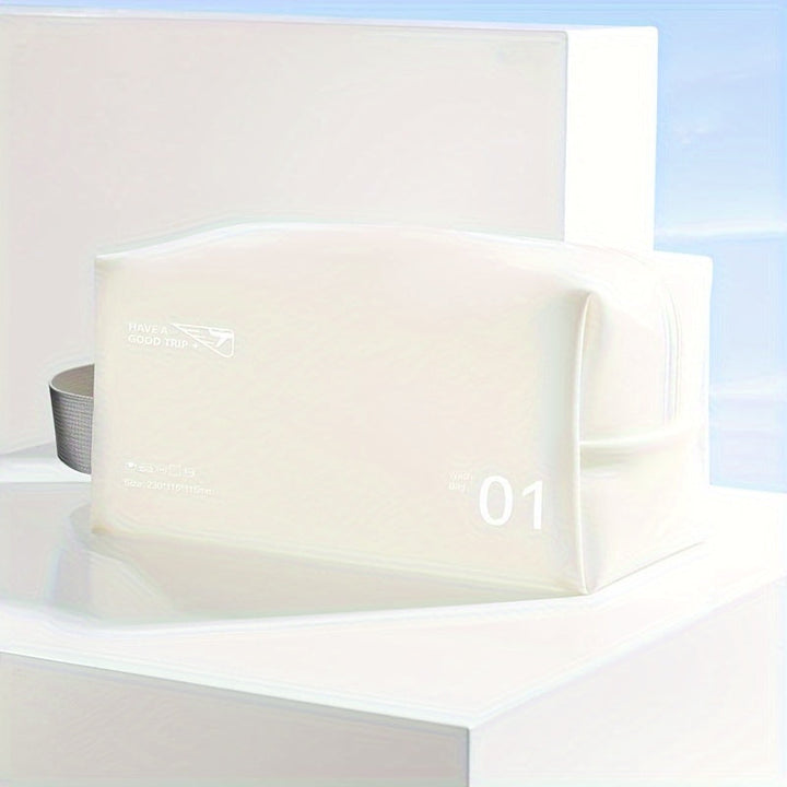 Elegante beauty case bianco con cerniera, design minimalista, ideale per viaggi. Accessorio da toilette compatto e moderno.