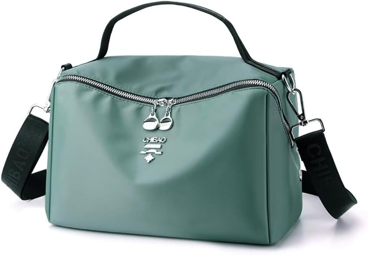 Borsa a tracolla verde acqua in nylon impermeabile, con cerniera e manico superiore, ideale per viaggi e uso quotidiano.