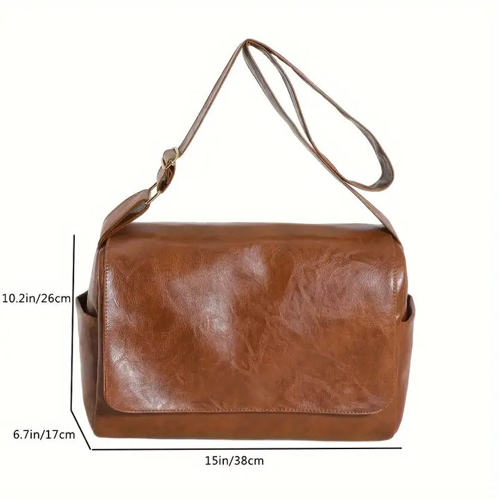 Borsa a tracolla in pelle marrone, dimensioni 38x26x17 cm, design elegante e spazioso, ideale per uso quotidiano e lavoro.