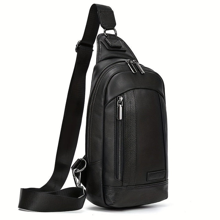 Zaino monospalla in pelle nera, design elegante e moderno, con cerniere multiple e tracolla regolabile. Ideale per uomo, moda urbana.