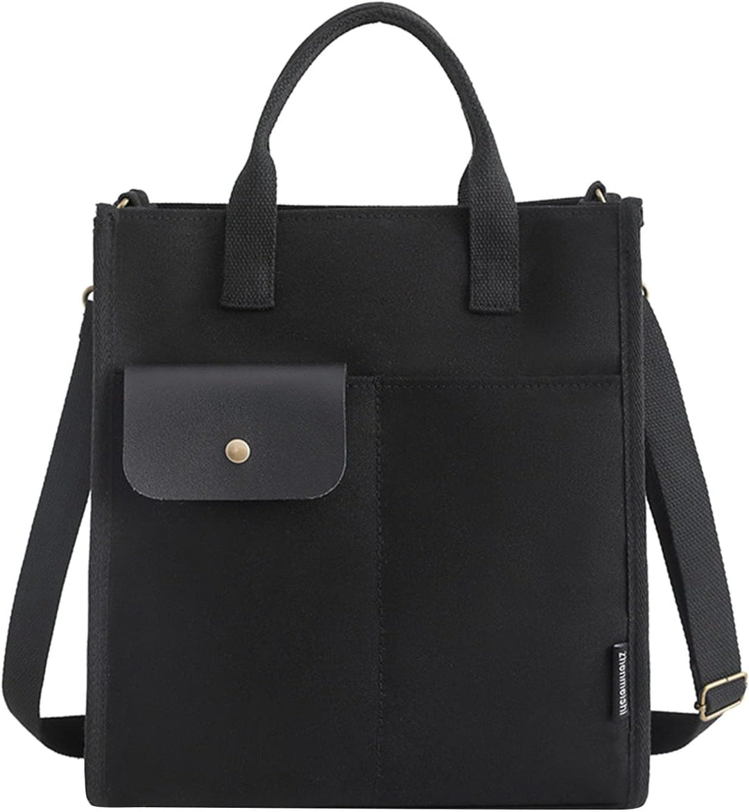Borsa tote nera in tela con tasca frontale e tracolla regolabile, design minimalista, ideale per lavoro e uso quotidiano.