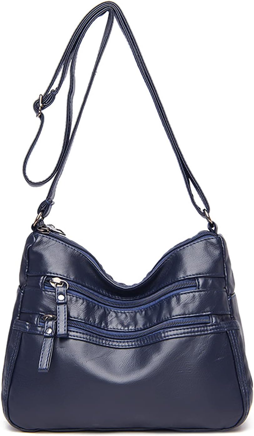 Borsa a tracolla in pelle blu scuro con cerniere multiple, design elegante e pratico, ideale per donna. Accessorio moda versatile e chic.