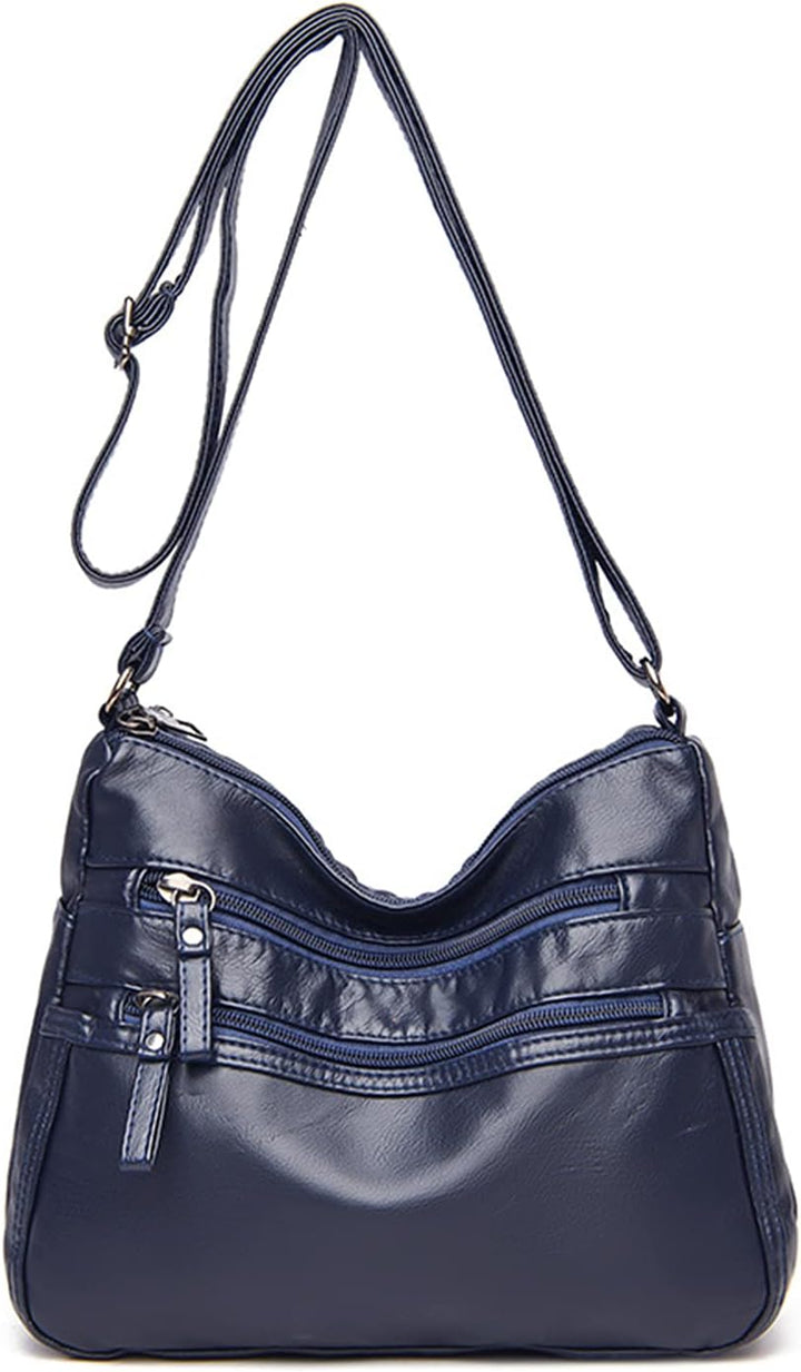 Borsa a tracolla in pelle blu scuro con cerniere multiple, design elegante e pratico, ideale per donna. Accessorio moda versatile e chic.