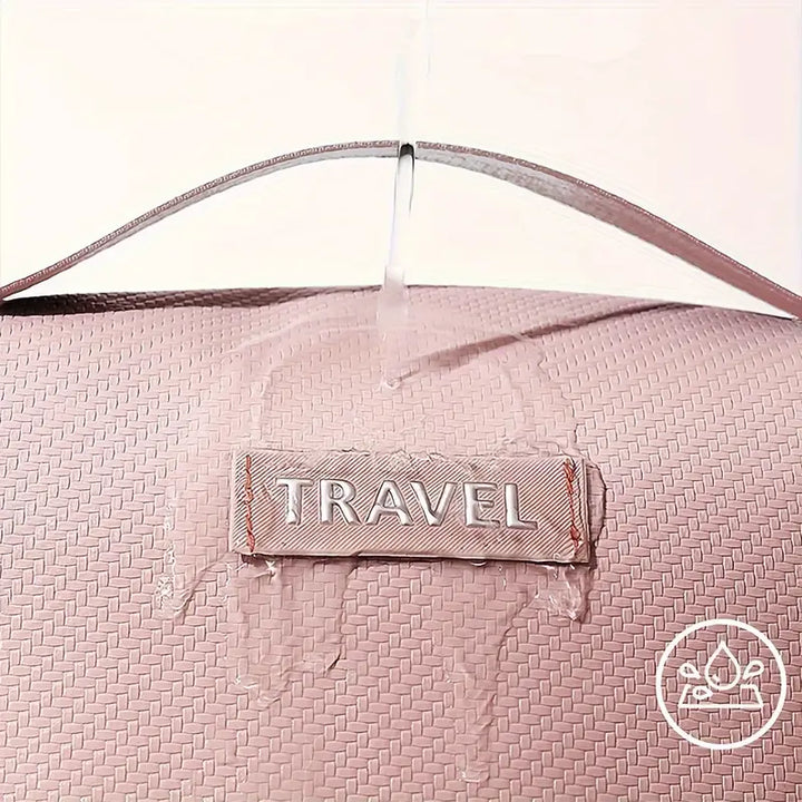 Borsa da viaggio rosa impermeabile con etichetta "TRAVEL", design elegante, resistente all'acqua, ideale per viaggi e organizzazione bagagli.