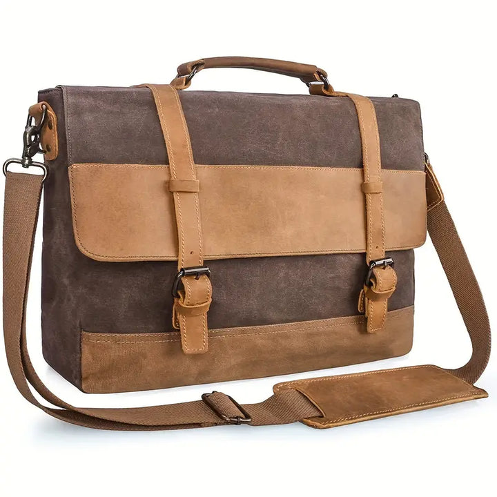 Borsa messenger in tela marrone e pelle, con tracolla regolabile, chiusure a fibbia, ideale per lavoro e viaggio. Elegante e funzionale.