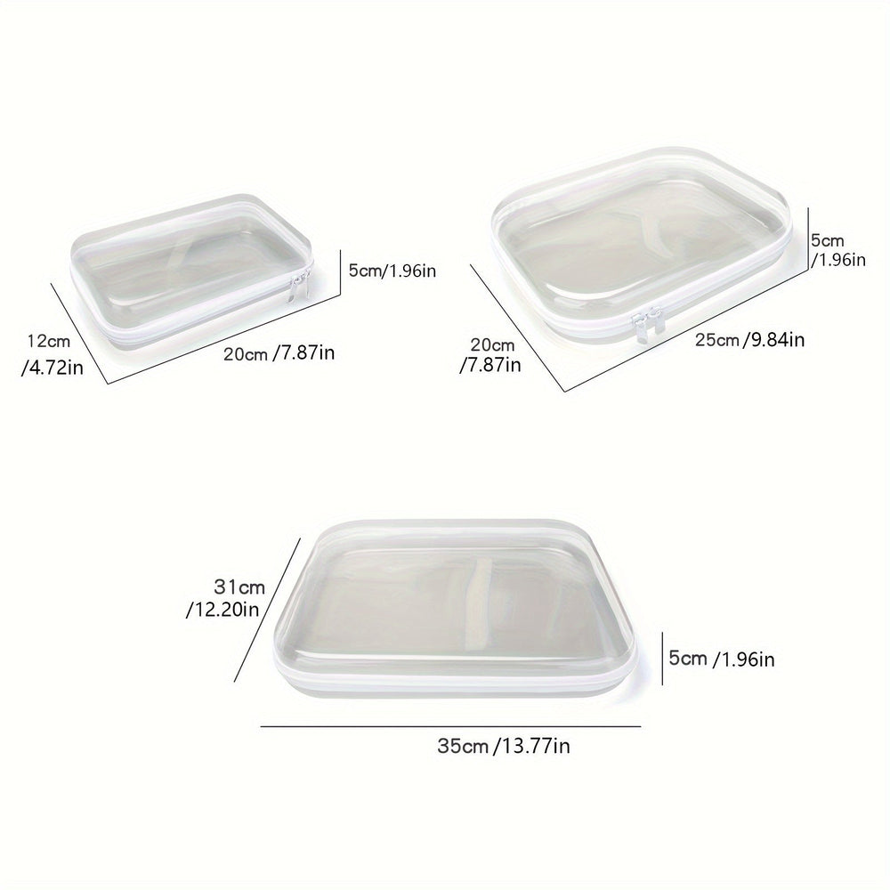 Set di tre contenitori in silicone trasparente con coperchio, dimensioni: 20x12x5 cm, 25x20x5 cm, 35x31x5 cm. Ideali per conservare alimenti.