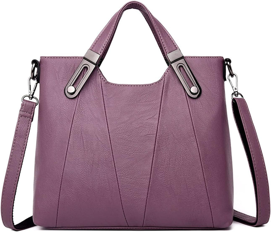 Borsa a tracolla in pelle viola da donna con manici rinforzati e tracolla regolabile. Design elegante, ideale per moda e shopping.