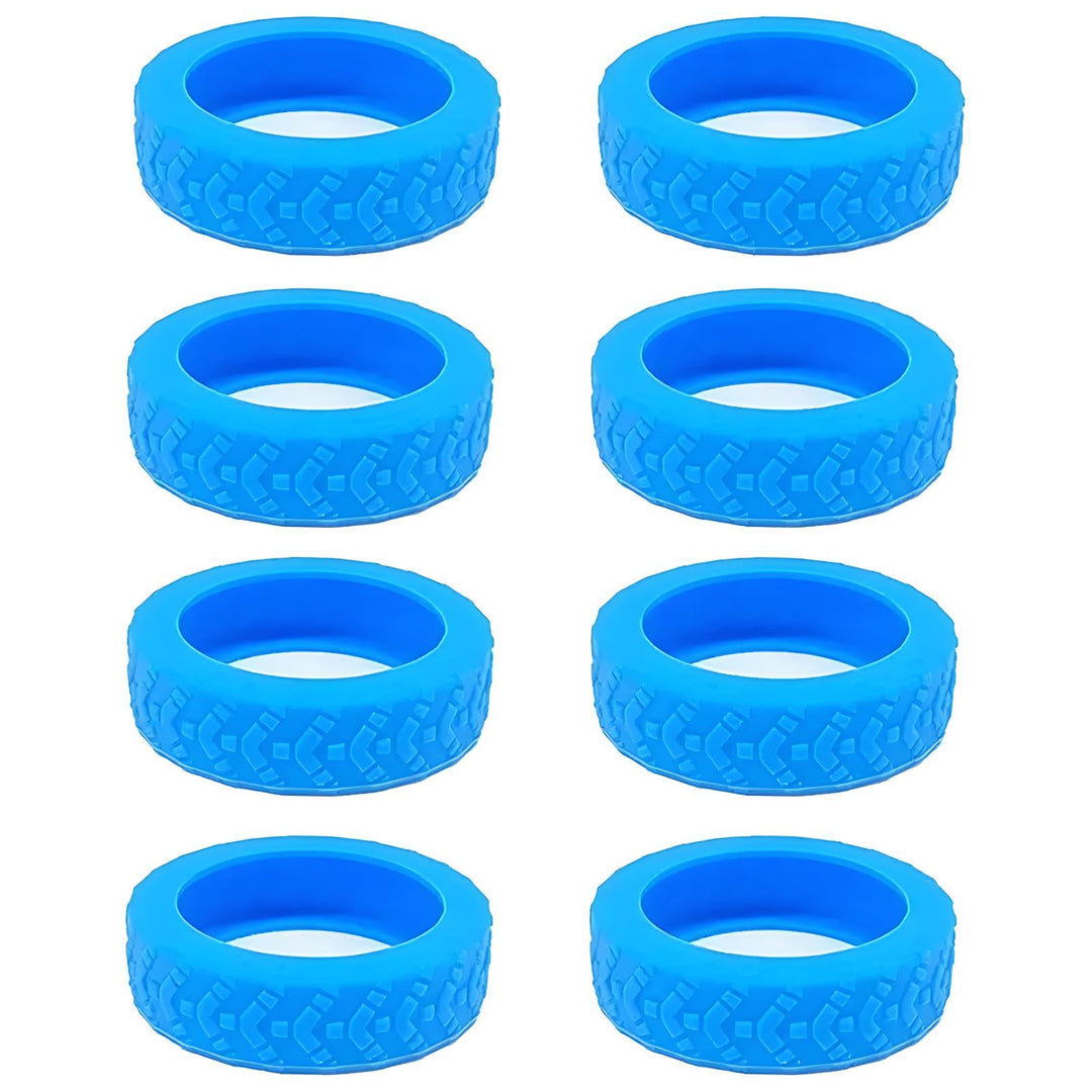 Otto gomme in silicone blu per giocattoli, con battistrada dettagliato, ideali per auto telecomandate. Accessori durevoli e di alta qualità.