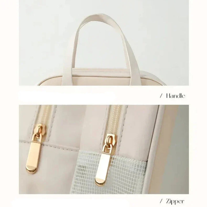 Borsa beige con manico e cerniera dorata, design elegante e minimalista, ideale per moda femminile e accessori di tendenza.