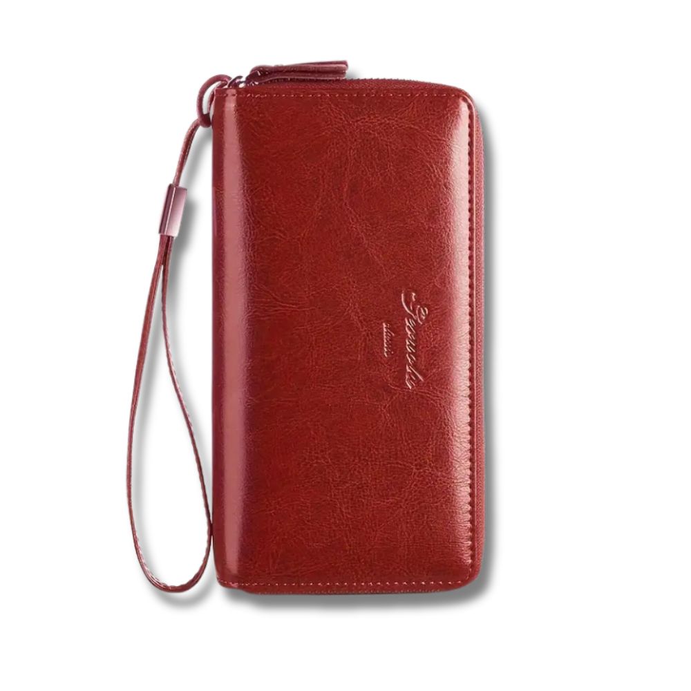Portafoglio donna in pelle rossa con cerniera e cinturino, design elegante, ideale per carte e contanti. Accessorio moda di alta qualità.