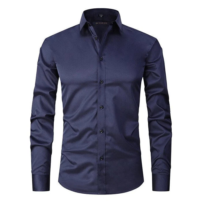 Camicia elegante da uomo blu scuro, maniche lunghe, colletto classico, bottoni frontali. Ideale per abbigliamento formale e casual.