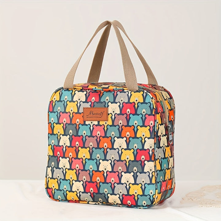 Borsa termica colorata con stampa di orsetti, manici beige, ideale per picnic e pranzo al sacco. Design vivace e funzionale per ogni occasione.
