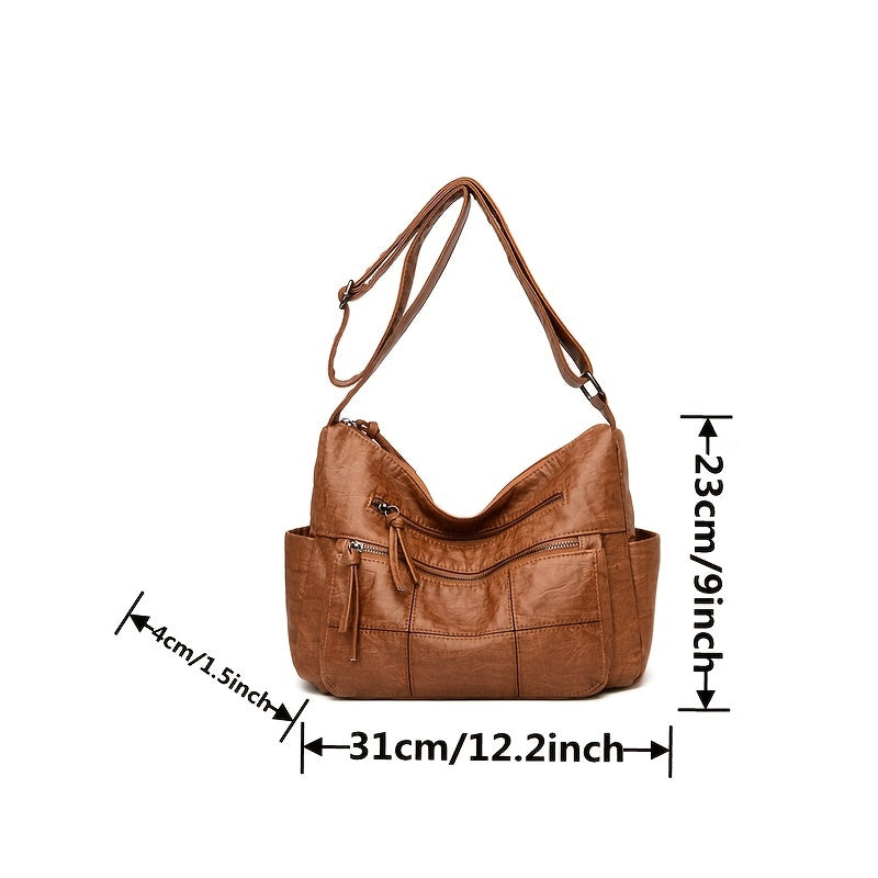 Borsa a tracolla in pelle marrone, dimensioni 31x23x14 cm, con tasche multiple e cerniere, ideale per moda donna e accessori eleganti.
