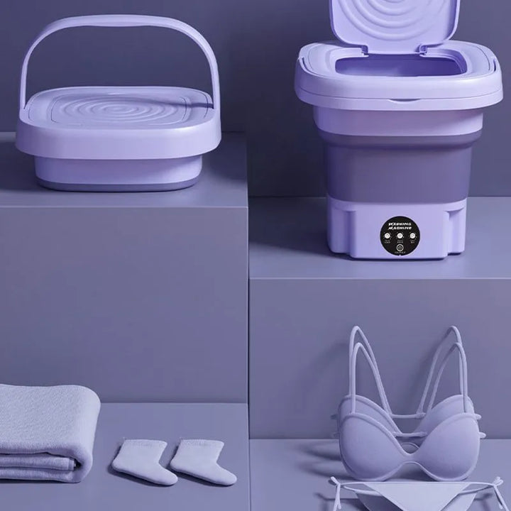 Lavatrice portatile pieghevole viola, ideale per piccoli spazi, con design compatto e accessori inclusi. Perfetta per viaggi e uso domestico.