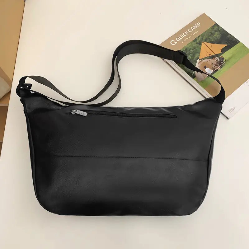 Borsa a tracolla nera in pelle sintetica con tasca frontale con zip, design moderno ed elegante, ideale per uso quotidiano e viaggi.