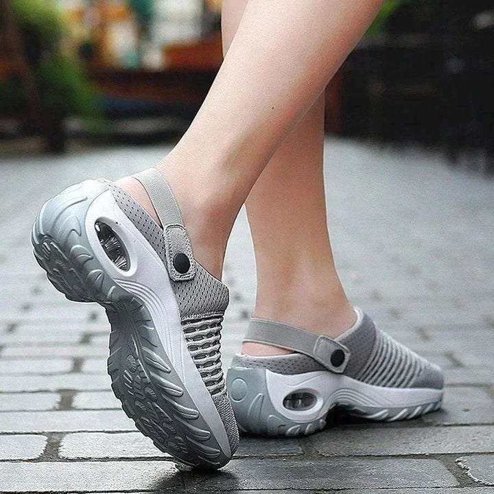 Scarpe da passeggio unisex grigie, suola antiscivolo, design traspirante, ideali per attività all'aperto, comfort e stile casual.
